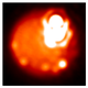 Lava lake Loki Patera shines brightly in this image of Io captured with Keck and Gemini.